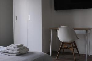 Postel nebo postele na pokoji v ubytování B&B Colori Del Lago