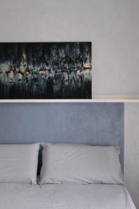 Postel nebo postele na pokoji v ubytování B&B Colori Del Lago