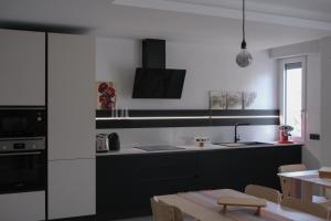 Kuchyň nebo kuchyňský kout v ubytování B&B Colori Del Lago