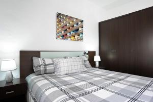 Postel nebo postele na pokoji v ubytování Casa El Muro