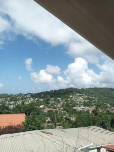 a view of a city from the roof of a building at Angie's Cove, modern get-away overlooking Castries in Castries