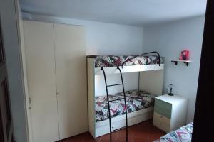 En eller flere senge i et værelse på Casa relax Pescocostanzo