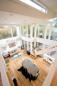 an overhead view of a living room with a table at The Madison Fire Island Pines in Fire Island Pines