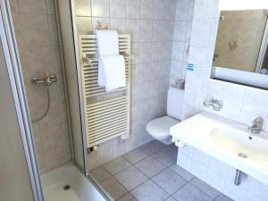 Vannituba majutusasutuses Hotel Acla Filli