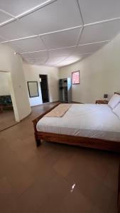 Katil atau katil-katil dalam bilik di Campement Jamarek