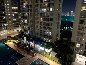 an aerial view of a building at night at 2 Bedrooms Scenic valley Big Free: Breakfast, Massage, More Discount Supermarket in Ho Chi Minh City