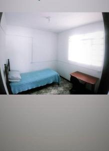 Ένα ή περισσότερα κρεβάτια σε δωμάτιο στο República Taberna