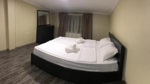Letto o letti in una camera di Friendly House
