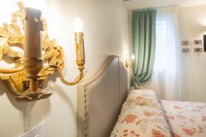 A bed or beds in a room at Soave Country House