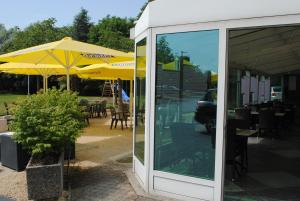 Patio nebo venkovní prostory v ubytování Motel - Hôtel La Poularde