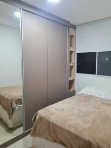 Una cama o camas en una habitación de Apartamento Interlagos autódromo