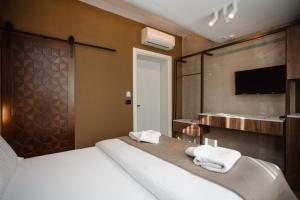 Uma cama ou camas num quarto em Hotel Flaer