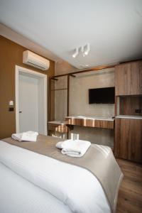 Uma cama ou camas num quarto em Hotel Flaer