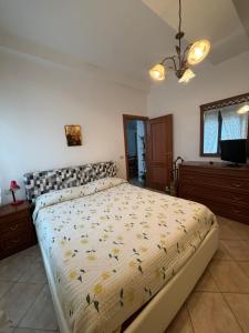 Postel nebo postele na pokoji v ubytování Nini House
