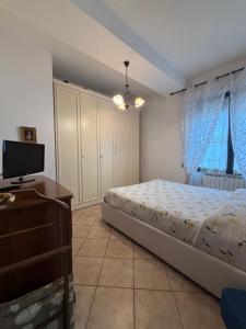 Postel nebo postele na pokoji v ubytování Nini House