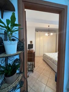 Postel nebo postele na pokoji v ubytování Nini House