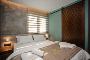 Uma cama ou camas num quarto em Hotel Flaer