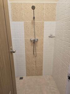 a shower with a glass door in a bathroom at Victory place 2 (Golden Mount) in Bangkok +58 photos