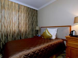 Postel nebo postele na pokoji v ubytování Buudai hotel + 20 fotografií