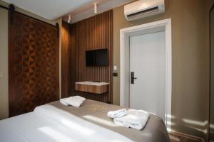 Uma cama ou camas num quarto em Hotel Flaer