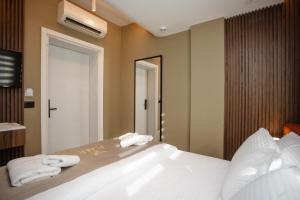Uma cama ou camas num quarto em Hotel Flaer