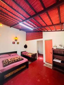Postel nebo postele na pokoji v ubytování Prakruti Home stay