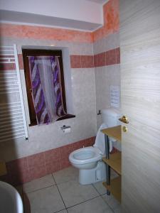 Um banheiro em Casa Gabriella