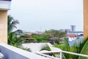 a balcony with a view of the city at LJ's Place in Lagos