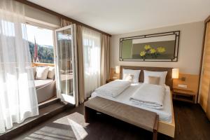 A bed or beds in a room at Hotel Marica