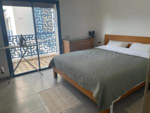 Voodi või voodid majutusasutuse MARTIL COSTA MAR Appartement de Luxe toas