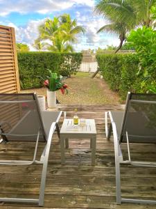 Zahrada ubytování APPARTEMENT T3, ORIENT BAY