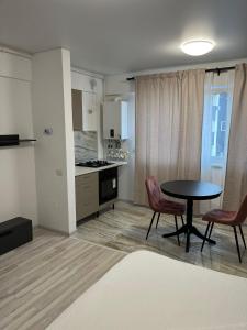 Η κουζίνα ή μικρή κουζίνα στο Pollux Residence Militari ap 94