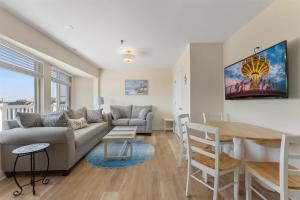 a living room with a couch and a table at 6109 Atlantic Ave, Unit 403 - The Cape Cod in Wildwood
