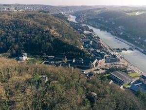 an aerial view of a city and a river at Unique Cottage w/ Amazing View & Private Wellness in Dinant