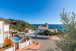 arial view of a villa with a view of the ocean at Nerja Villas Tamango Hill 5 Silhouse in Torrox
