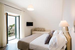Ένα ή περισσότερα κρεβάτια σε δωμάτιο στο Villa la Torretta