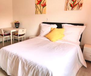 Ένα ή περισσότερα κρεβάτια σε δωμάτιο στο Vinaring Homestay