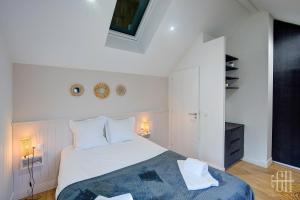 En eller flere senge i et værelse på Ambra - Château d'Amboise