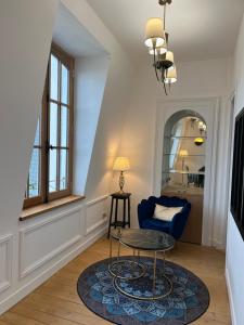 TV o dispositivi per l'intrattenimento presso Le Royal XIX Dinard vue mer luxe
