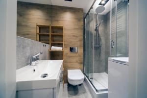 Kúpeľňa v ubytovaní Warsaw Concierge Silver Apartment