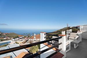 a balcony with a view of the ocean at El Hierro Bed Urban in Valverde