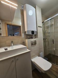 Kúpeľňa v ubytovaní Apartament Bałtyk + 11 fotografií