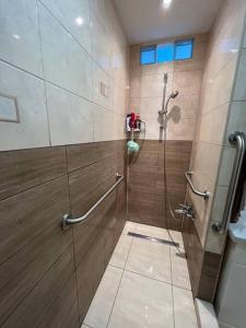 a bathroom with a shower with a glass door at Tichá lokalita, MHD do 5 minút, len 2 km od centra in Košice