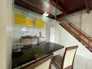 Η κουζίνα ή μικρή κουζίνα στο Flat Amarração +8 φωτογραφίες