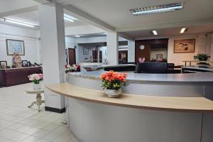 Lobbyn eller receptionsområdet på Toucan Bed and Cafe