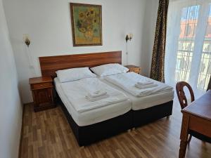Ένα ή περισσότερα κρεβάτια σε δωμάτιο στο Hotel Union