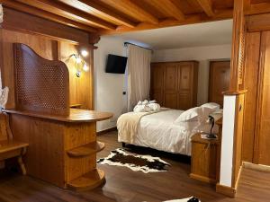 Cama o camas de una habitación en Hotel El Mondin