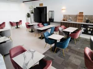 Posezení v ubytování Arrow Hôtel