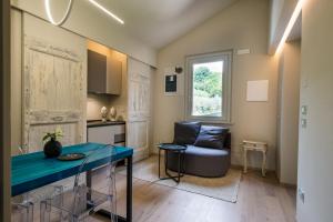 a living room with a table and a couch at La Casa 570 in Perugia +42 photos