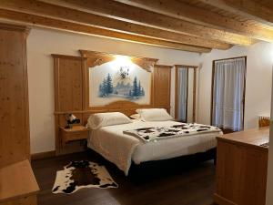 Cama o camas de una habitación en Hotel El Mondin